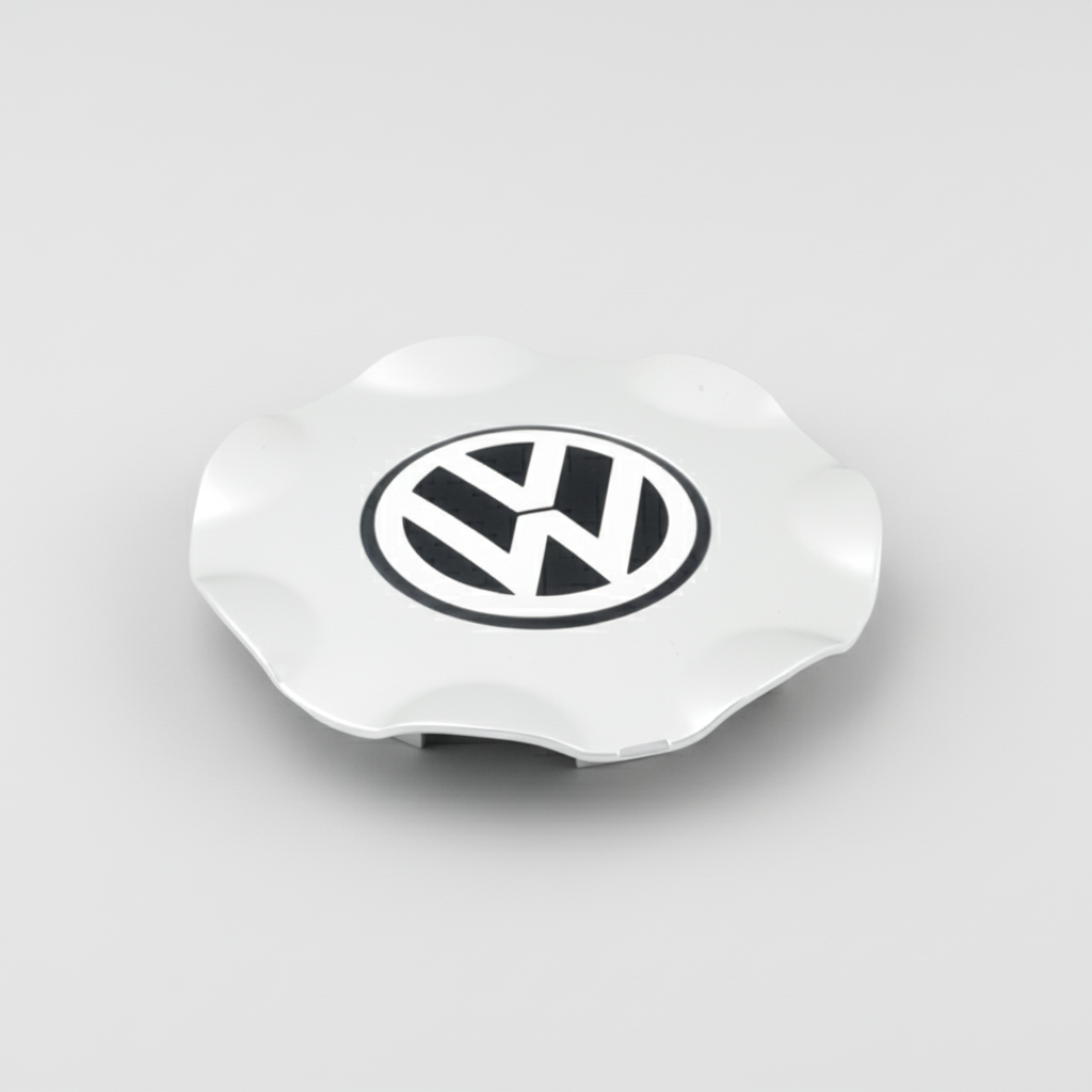 White car hubcap with Volkswagen logo on a white background